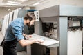 Printing operator working at the manufacturing