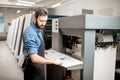 Printing operator working at the manufacturing