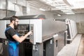 Printing operator working at the manufacturing