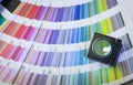 Printing process with magnifying glass and color swatches Royalty Free Stock Photo