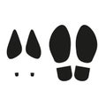 Prints of the soles of women`s and men`s shoes. Set of black icons on white background.