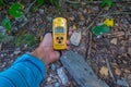 PRIPYAT, UKRAINE, AUGUST 30, 2019: Male hand holding a geiger counter in Pripyat town in the Ukraine