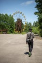 Man goes to the ferris wheel in Pripyat amusement park