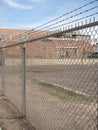 Prison barb wire wall and prison building