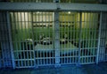 Prison cell behind the bars in America Royalty Free Stock Photo