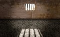 Prison cell, inside a prison cell. Window of a penitentiary. Shadows projected on the ground. Prison sentence, window bars.