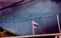 Prison fence with barbed wire