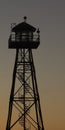 Prison guard watch tower at dusk Royalty Free Stock Photo