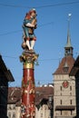 Prison Tower and Piper Statue and Fountain by Gieng in Bern Royalty Free Stock Photo
