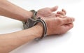 Prisoner with his hands chained isolated on white background Royalty Free Stock Photo