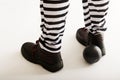 Prisoner legs with chain ball Royalty Free Stock Photo