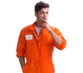 Prisoner in orange robe isolated on white background Royalty Free Stock Photo