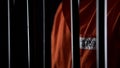 Prisoner in orange uniform standing behind bars, punishment for committed crime Royalty Free Stock Photo