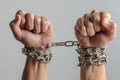 The prisoner`s hands are bound in metal chains Royalty Free Stock Photo