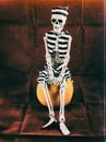 Prisoner Skeleton Sitting on Pumpkin Royalty Free Stock Photo