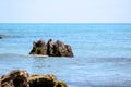 Pristine beach and beautiful rocks in the azure sea