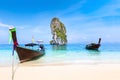 Pristine beach turquoise water longtail boats, Krabi, Thailand travel destination