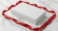Blank White Gift Box with Red Ribbon on Marble Background Royalty Free Stock Photo