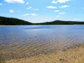 The pristine clear waters of Sandy Pond in Terra Nova National Park, Newfoundland and Labrador, Canada. Royalty Free Stock Photo