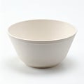 Simple ivory colored bowl, creating soft shadows in a clear composition on white background Royalty Free Stock Photo