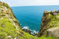 Pristine sea with rocky cliff at Dai Lanh cape point, Mui Dien, Phu Yen province, easternmost of Viet nam. Royalty Free Stock Photo