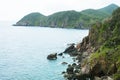 Pristine sea with rocky cliff at Dai Lanh cape point, Mui Dien, Phu Yen province, easternmost of Viet nam. Royalty Free Stock Photo