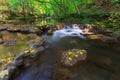 Pristine waterfalls deep in the woods, in autumn