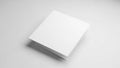 A pristine white box standing alone on a light gray background Royalty Free Stock Photo
