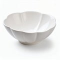 Elegant fluted ceramic bowl, simplistic design, pristine white surface, studio shot on white background Royalty Free Stock Photo