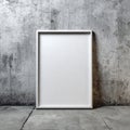 Blank White Vertical Frame Mockup on Grungy Concrete Wall Royalty Free Stock Photo