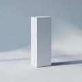 A pristine white rectangular box standing alone against a gradient blue background Royalty Free Stock Photo