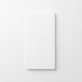 A pristine white rectangular object standing upright against a plain background Royalty Free Stock Photo