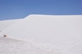 Pristine white sand dune contrasting blue sky