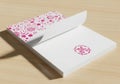 Elegant white stationery set with pink floral pattern envelope isolated on white background Royalty Free Stock Photo