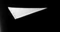 Pristine White Triangle on Black: Minimalist Composition, High Contrast, Elegant Simplicity Royalty Free Stock Photo