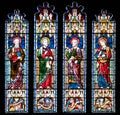 Prittlewell, Essex, UK, 6 July 2018: stained glass window depicting saints at St. Marys church, Prittlewell, Essex. Royalty Free Stock Photo