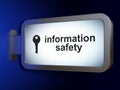 Privacy concept: Information Safety and Key on billboard background