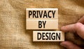 Privacy by design symbol. Concept words Privacy by design on wooden blocks on a beautiful canvas table canvas background. Royalty Free Stock Photo