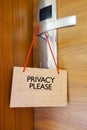 Privacy please sign on door knob of a hotel room Royalty Free Stock Photo