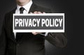 Privacy Policy sign is held by businessman