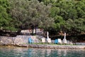 Private beaches on mediterranean sea. Chairs, deck chairs, sun loungers and parasols waiting for tourists.