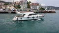 Private boat traveling along the Bosphorus, Istanbul, Turkey