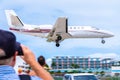 Private business jet aircraft Cessna 560 prepares to land at SXM