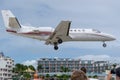 Private business jet aircraft preparing to land