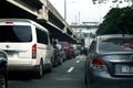 Private cars and other vehicles at a traffic congested road in Metro Manila