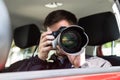 Private Detective Photographing With Slr Camera