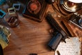 Private detective`s desk, noir still life with a vintage phone, typewriter, lamp, gun and retro photos Royalty Free Stock Photo