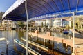 Private dock with jet ski lifts and covered boat lift, Lake Washington. Royalty Free Stock Photo