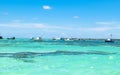 Private fishing boats in blue ocean water, Panoramic view. Royalty Free Stock Photo