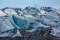 Private guide and group of hiker walking on glacier at Solheimajokull